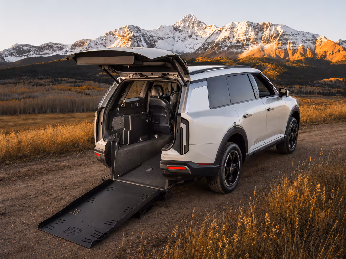 Accessible 2027 Kia Telluride Hero — ramp deployed, rear 3/4